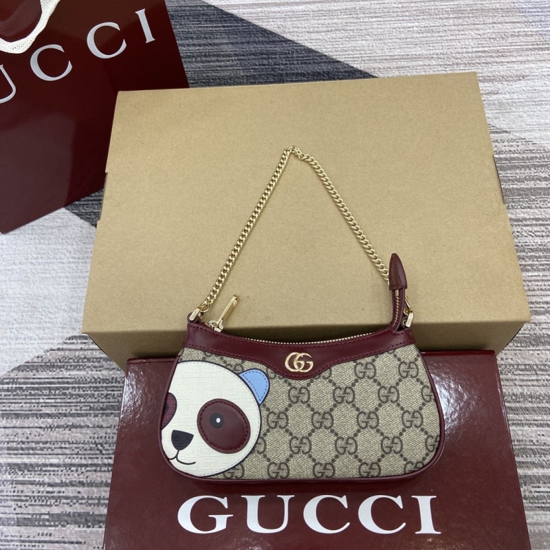 G*u*i top handle bags